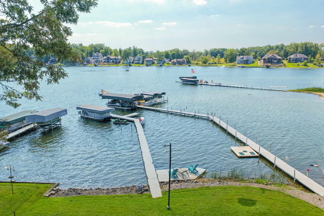 The estate's private dock system extending out across open water